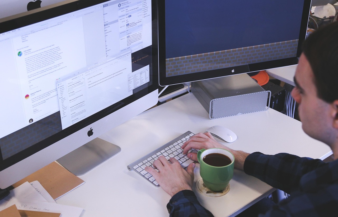 Typing, computer, man — The Benefits of Partnering with Experts for Online Reputation Protection